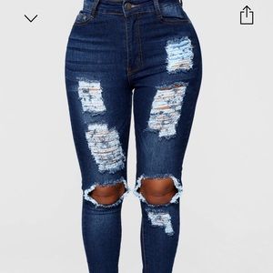 Dark blue ripped jeans
